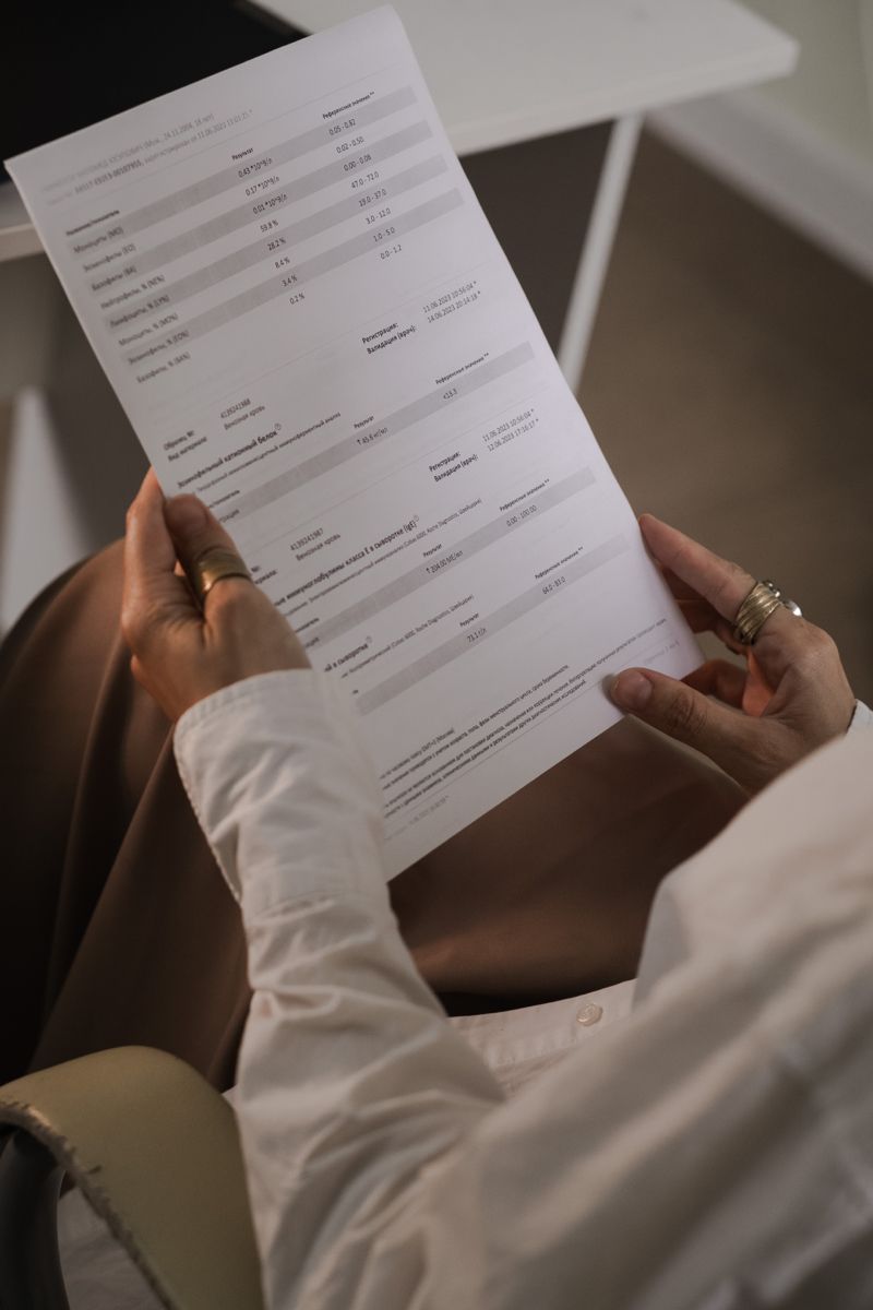 A woman reading her blood test results